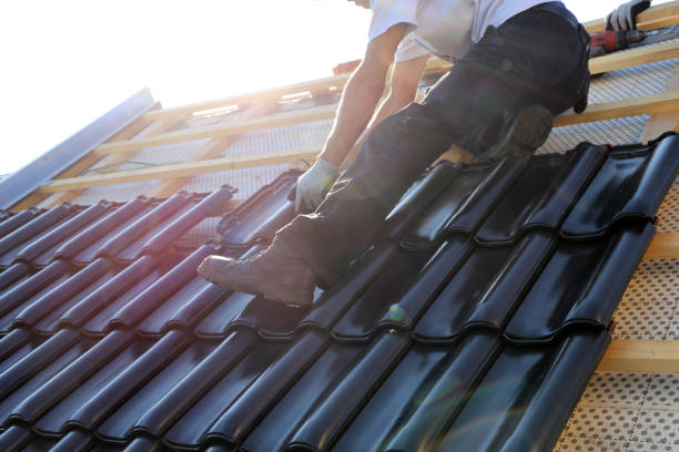 Roofing contractors working on a new roof